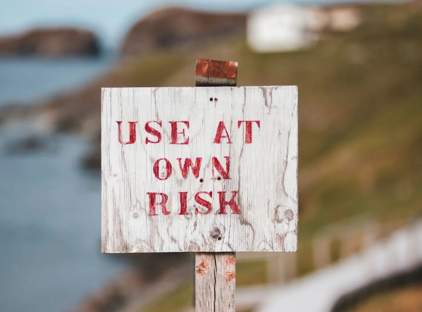 Use at own risk warning sign